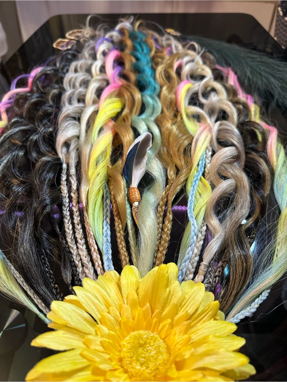 Colorful Braided Hair Extensions with Feather Accent